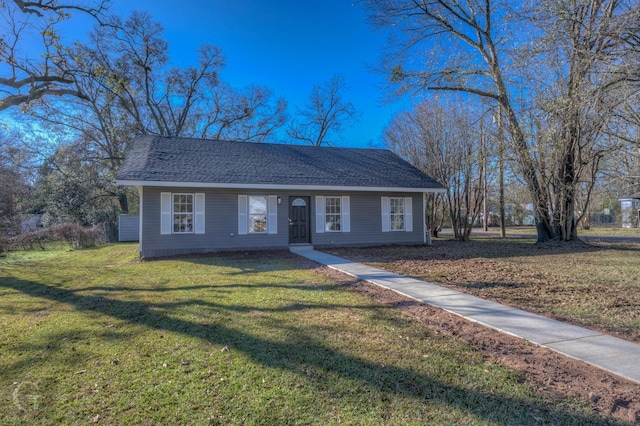 ranch-style home with a front yard