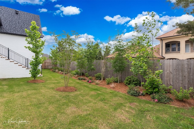 view of yard with fence