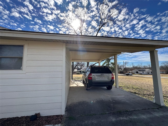 view of parking with a carport