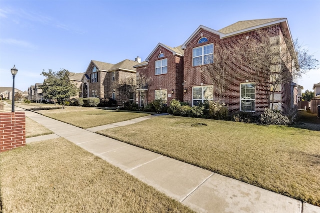 view of front facade with a front yard