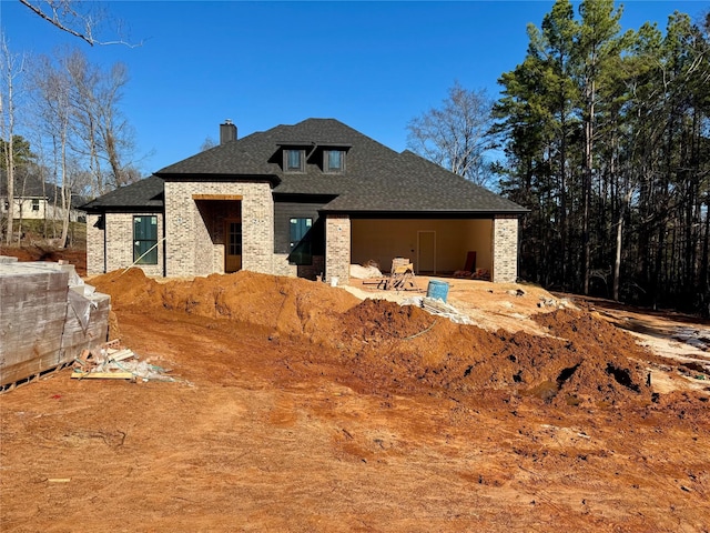 view of front of home with a patio area