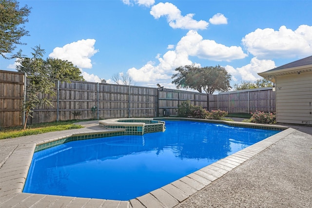 view of pool featuring an in ground hot tub