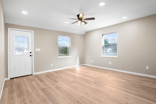 interior space featuring ceiling fan, a healthy amount of sunlight, and light wood-type flooring