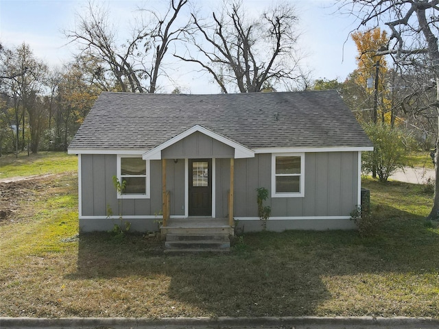 view of front of home with a front yard