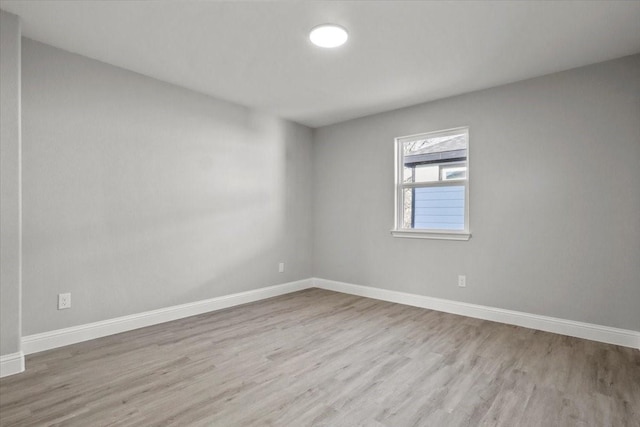 unfurnished room featuring light hardwood / wood-style floors