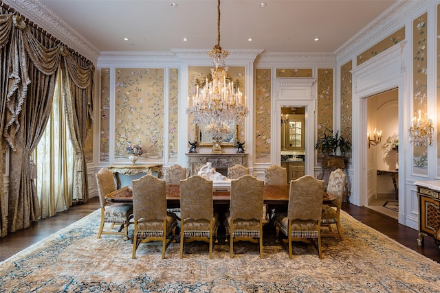 dining area featuring crown molding, dark hardwood / wood-style flooring, and an inviting chandelier