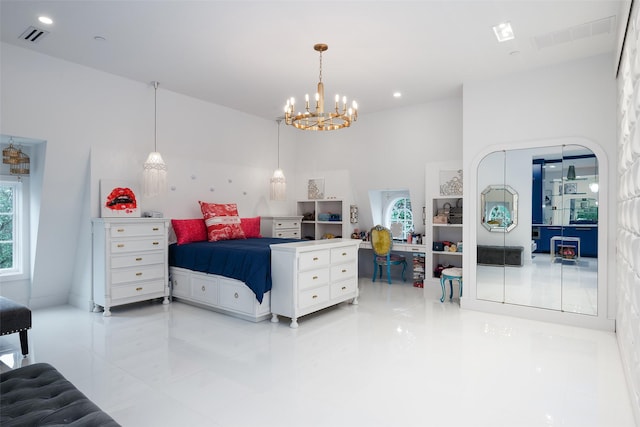 bedroom featuring a chandelier