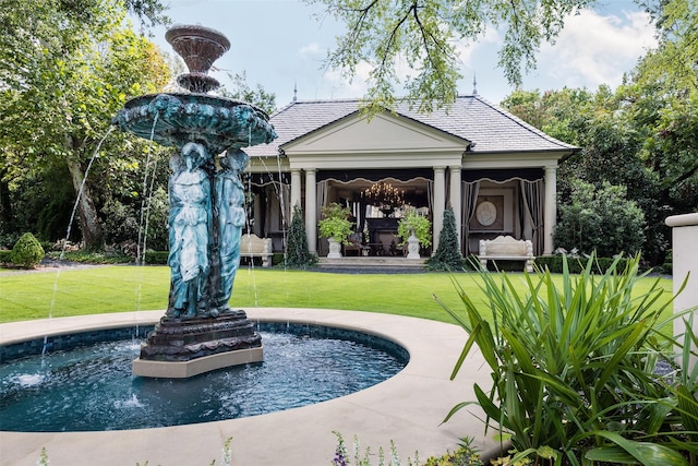 view of home's community featuring a lawn and a gazebo