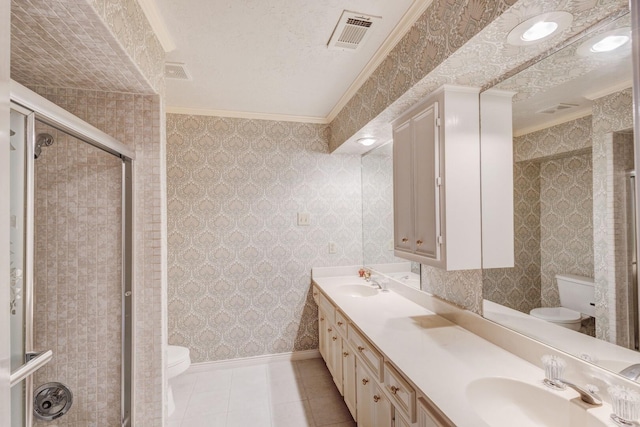 bathroom with walk in shower, tile patterned flooring, crown molding, toilet, and vanity