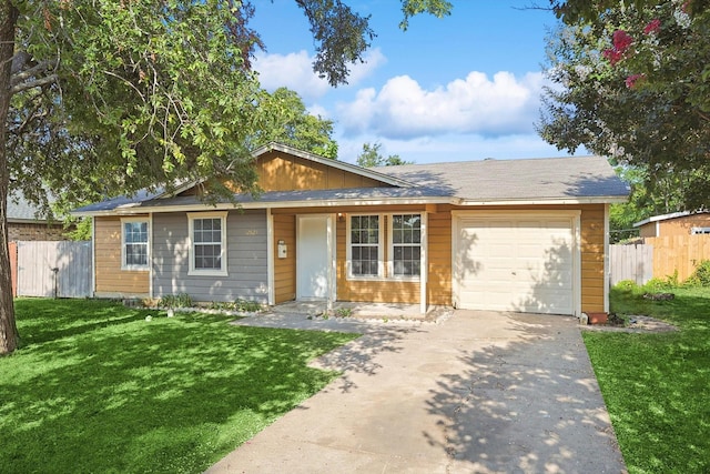 ranch-style home with a garage and a front lawn