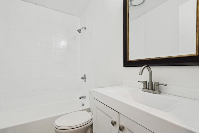 full bathroom featuring vanity, toilet, and tiled shower / bath combo