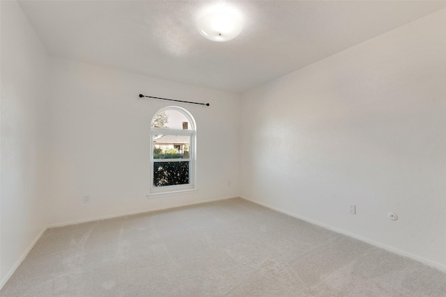 empty room with carpet floors