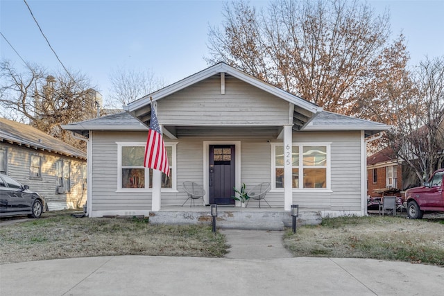 bungalow-style home featuring covered porch