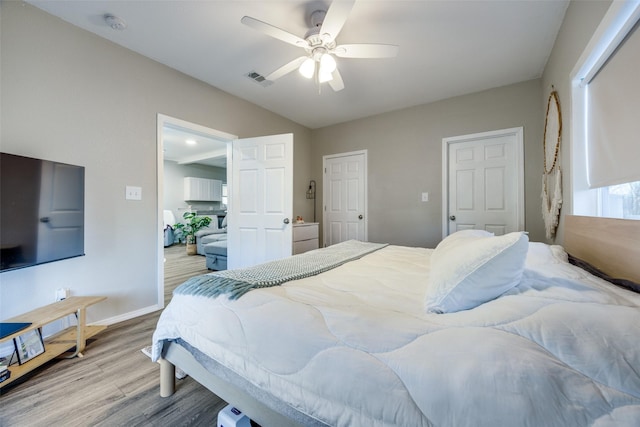 625 S Montgomery St, Sherman, TX 75090 - bedroom featuring wood finished floors, baseboards, vaulted ceiling, and ceiling fan