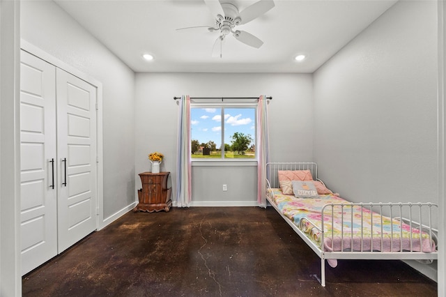 bedroom featuring ceiling fan and a closet