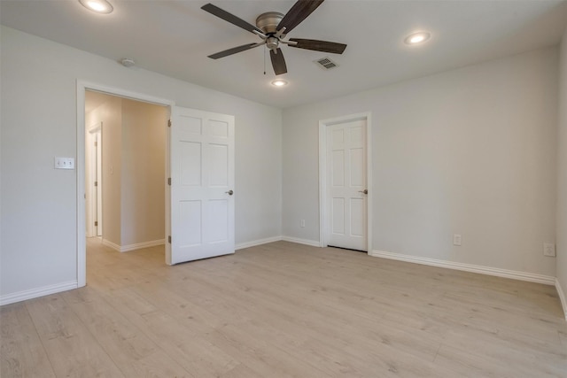 unfurnished bedroom featuring light hardwood / wood-style flooring and ceiling fan