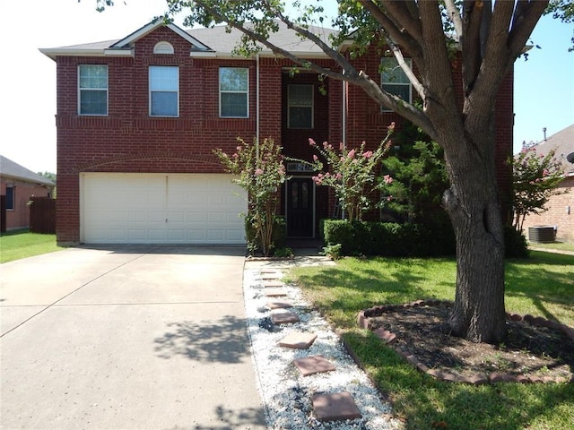 view of front facade featuring a front yard, a garage, and cooling unit