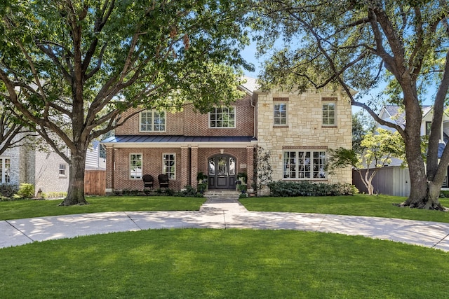 view of front of home with a front yard