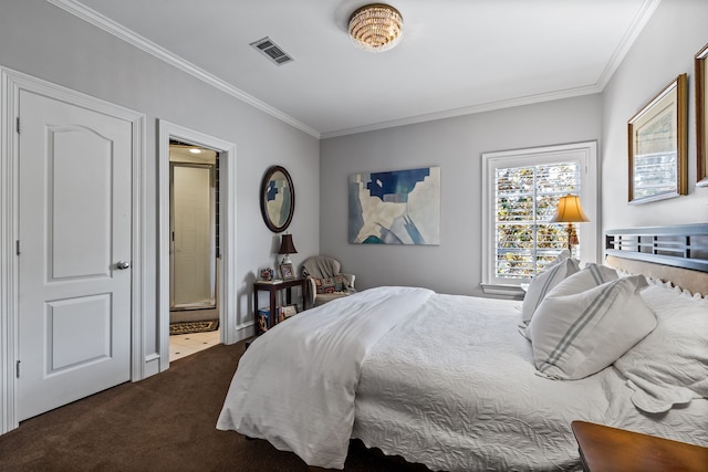 carpeted bedroom featuring crown molding and ensuite bathroom