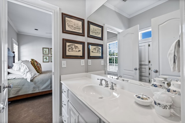 bathroom featuring vanity and ornamental molding