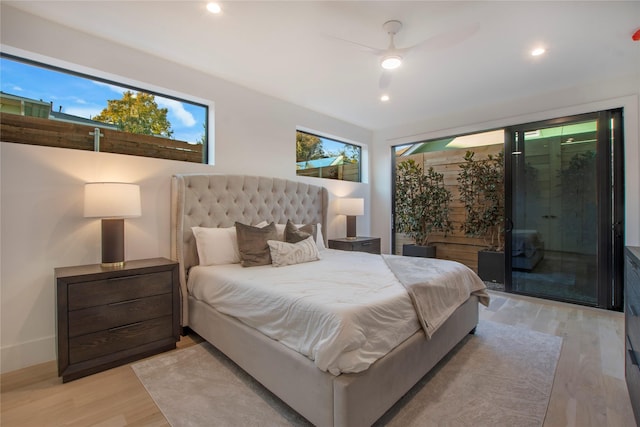 bedroom with access to exterior, ceiling fan, and light wood-type flooring