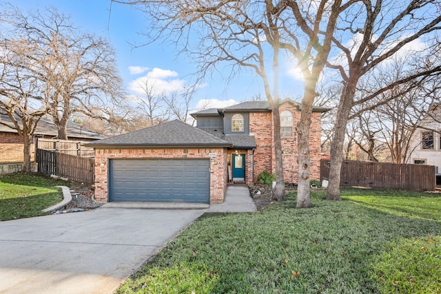 view of front of home with a garage and a front lawn