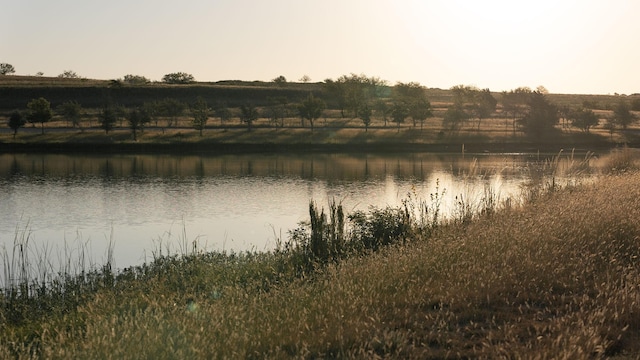 view of water feature with a rural view