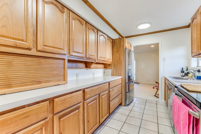 kitchen featuring dishwasher, sink, stainless steel fridge, light tile patterned floors, and crown molding