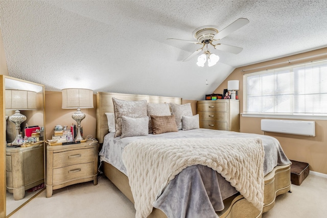 carpeted bedroom with ceiling fan, a textured ceiling, and lofted ceiling