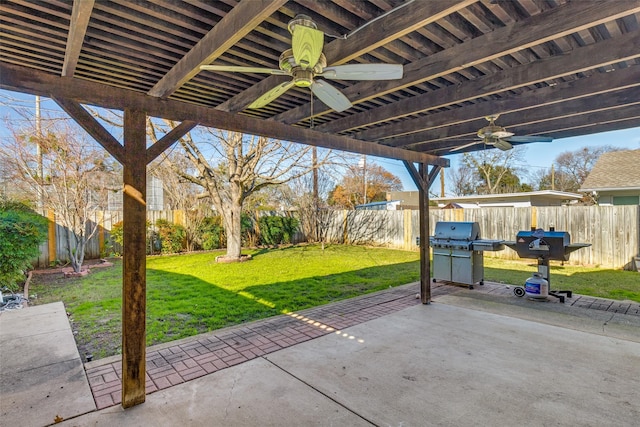 view of patio with ceiling fan and grilling area