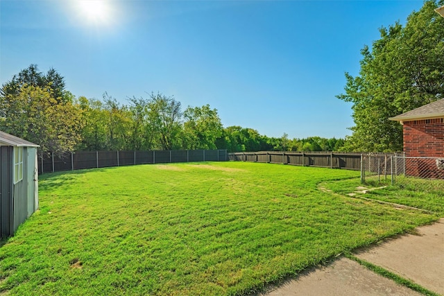 view of yard featuring a fenced backyard