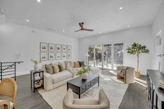 living room with hardwood / wood-style flooring and ceiling fan