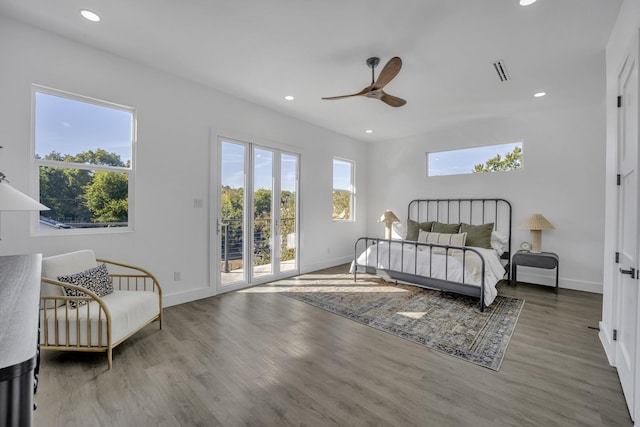 bedroom featuring access to outside, ceiling fan, and hardwood / wood-style floors