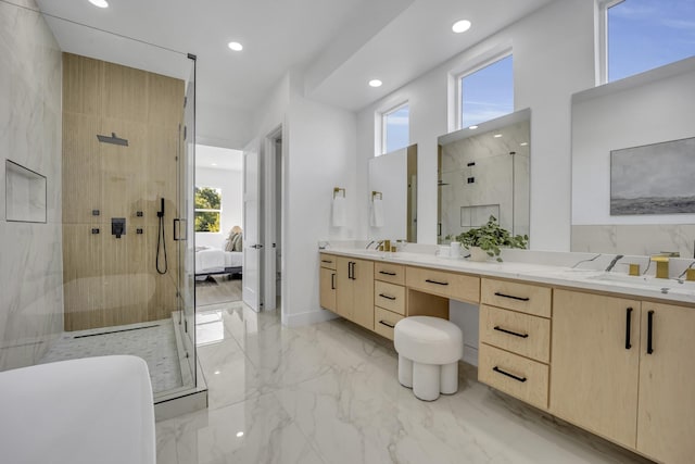 bathroom featuring vanity and a tile shower