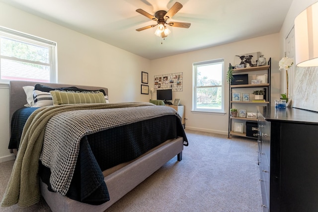 bedroom featuring ceiling fan and carpet floors