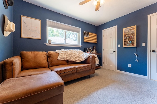 living room featuring carpet flooring and ceiling fan