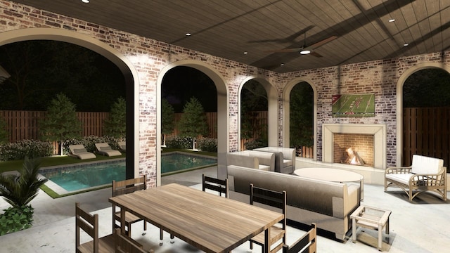 view of patio featuring an outdoor living space with a fireplace, ceiling fan, and a pool