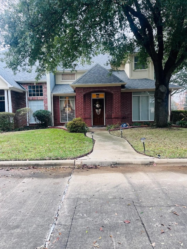 view of front of house with a front yard