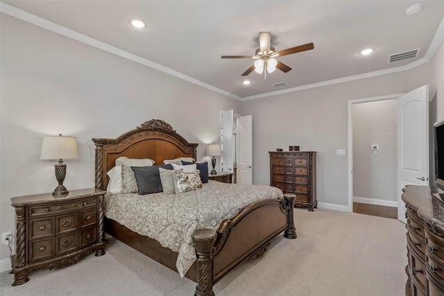 bedroom with light colored carpet, ceiling fan, and ornamental molding