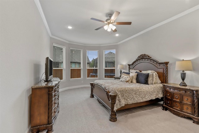 carpeted bedroom with ceiling fan and crown molding