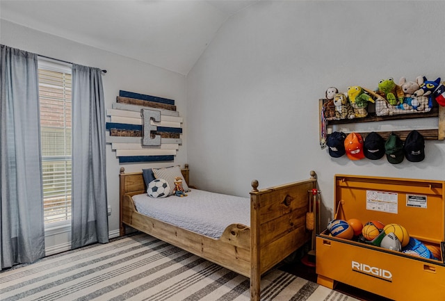 bedroom with vaulted ceiling