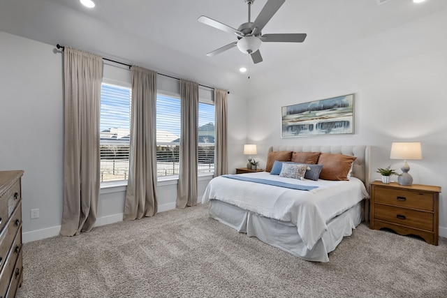 bedroom with light colored carpet and ceiling fan