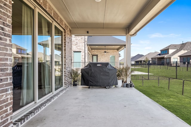 view of patio / terrace featuring grilling area and ceiling fan