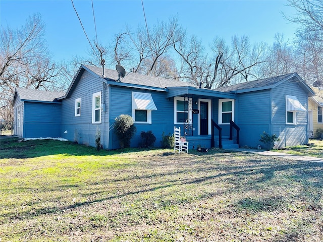 ranch-style house with a front yard