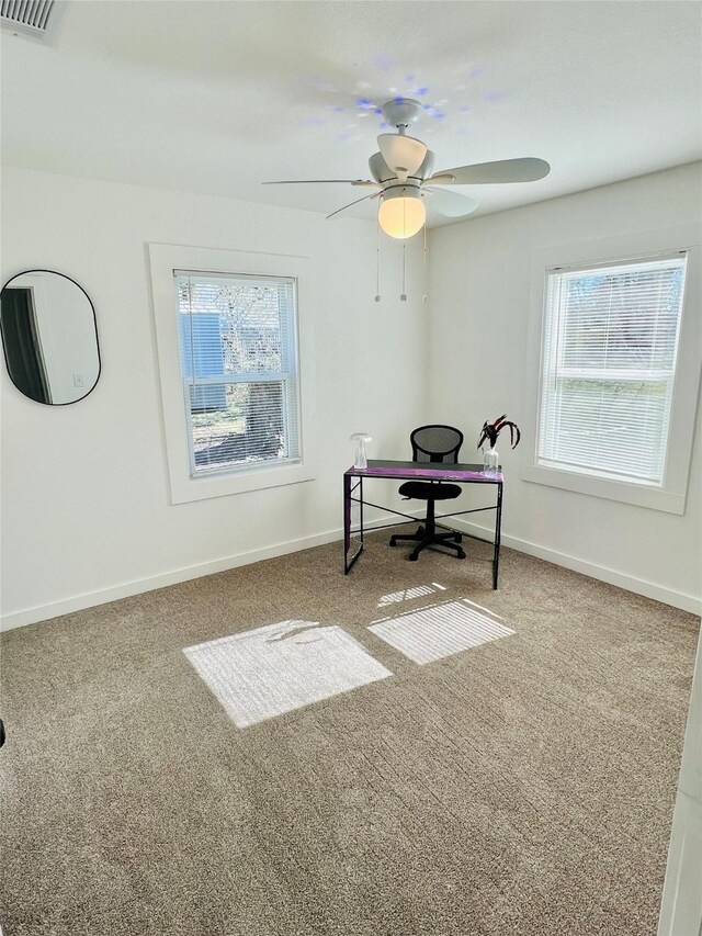 unfurnished living room with crown molding, ceiling fan, and dark wood-type flooring