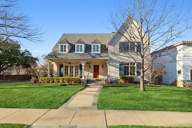 view of front of home featuring a front lawn and a porch