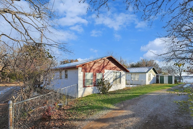 view of home's exterior featuring a yard