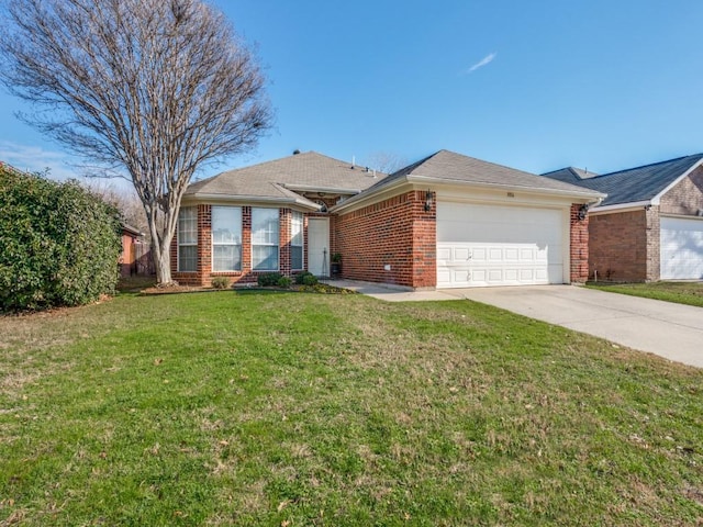 ranch-style home featuring a garage and a front lawn