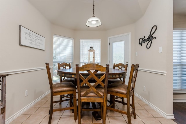 dining room with light tile patterned floors