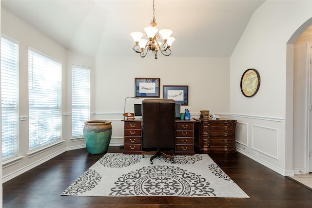 office space with a chandelier, dark hardwood / wood-style flooring, and lofted ceiling